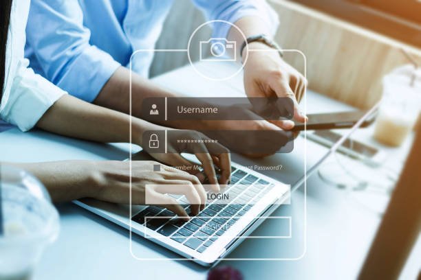 Business professionals accessing a laptop displaying a login screen for Correct online credit report errors.